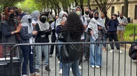 Columbia University: Pro-Palestinian demonstrators chant near campus gates