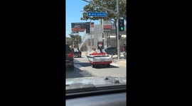 Boat Car Cruises Down Sunset Boulevard in LA