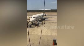 Passengers injured during emergency escape from smoke-filled plane