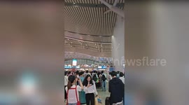 Passenger sprayed with water from leaking pipe at train station