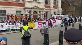 Pro-Palestine protesters block the entrances of Business and Trade Department