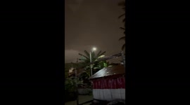 Dark morning in Talisei Island, North Sulawesi as Mount Ruang volcanic ash cover the sky