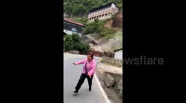 Terrified woman flees as massive landslide strikes southwest China