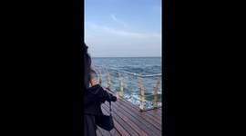 Hilarious scene as unsuspecting girl is soaked by huge wave in Ukraine