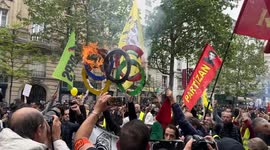 Olympic rings burnt during May Day protests in Paris