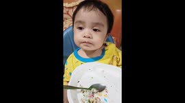 Adorable Indonesian Baby Fall Asleep As He Is Having Dinner