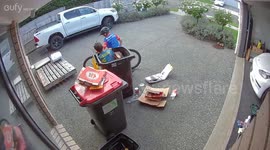 Kid Takes a Fall in a Rubbish Bin