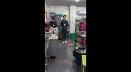 Kitchen mishap: waiter's slippery military march fail