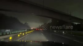 Tornado triggers sparks from high voltage power pole in Guangzhou