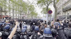 Police clash with protesters at Paris's Place De La Bastille on Labour Day 2024
