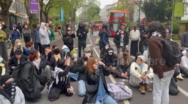 Protestors black street to prevent the removal of refugees.