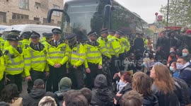 Police battle to maintain control as protestors attempt to stop removal of refugees from hotel.