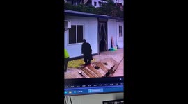 Woman slips on the side of the road in China