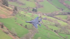 USAF F-15E Strike Eagles on a low level training mission in the Mach Loop area of Wales
