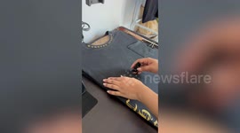 Artist shows how to paint awesome skeleton onto t-shirts