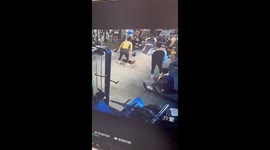 Gym bro topples over while doing steps and weight lifting together