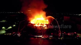 Century-old cultural relic destroyed as fire engulfs university's auditorium in China