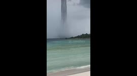 Water spout hovers over Playa del Carmen Shore
