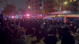 USA: NYPD police officer slams a woman into a car at Gaza Solidarity Encampment protest in NYC