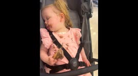 'When the Ice Cream is just TOO GOOD!' - Sleepy toddler refuses to let go of ice cream