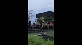 Indonesia's close call: gridlock chaos on train tracks