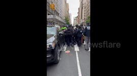USA: Protester is arrested by NYPD police