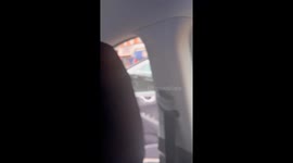 Taxi Driver Smashes Vehicle's Window