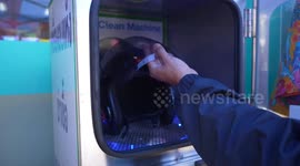 Motorcycle helmet cleaning machine impresses riders in Bangkok