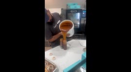 From buckets to brilliance: Flawless pouring technique of Cinnabon's syrup maestro