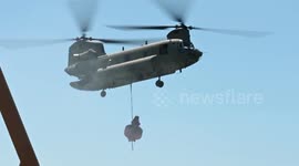 Coast Guard and National Guard team up to retrieve beached buoy in New Jersey
