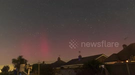 Northern lights over UK illuminate Kent skies in reddish hues