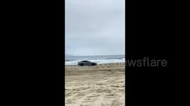 Car drifting on beach strikes pedestrian in southern China