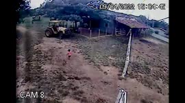 Grandfather Saves Child from Tractor's Wheel