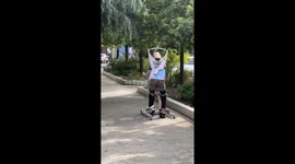 Mother straps her paralyzed son to her back for rehabilitation training in southwest China