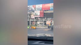 Awesome modified car cruises through junction