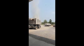 Dust devil tornado whips through petrol station