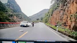 Brave bus driver saves woman from rolling vehicle on road