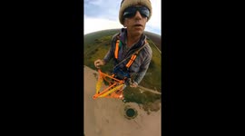 Man on 69 meter mast shows process installing broadcasting and wireless links