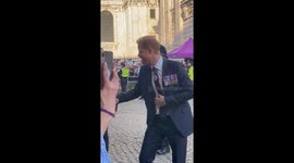 Prince Harry emerges from St Paul's Cathedral during the Invictus Games anniversary