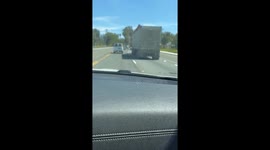Stuffed Dog Hitches a Ride on Semi