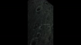 Light through rain drops flowing on jeans