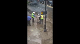 Springfield MA USA Water Main Break/ Sinkhole - Authorities Help Elderly Couple Trying to Cross the Street