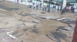 Huge sinkhole opens on road after water main breaks in Springfield, Massachusetts