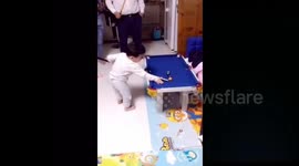 Three-year-old boy shows off incredible snooker skills