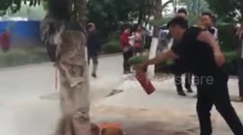 Groom covered in dog's blood in Chinese wedding tradition