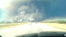Huge plumes of smoke rising out of Fort McMurray, Canada