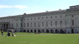 People enjoy The Sun In Grewnwich park