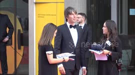 Brian Cox and Louis Theroux on the red carpet at the TV Baftas in London