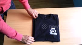 How to fold a t-shirt in three moves