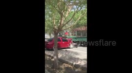 Tractor driver smashes up cars